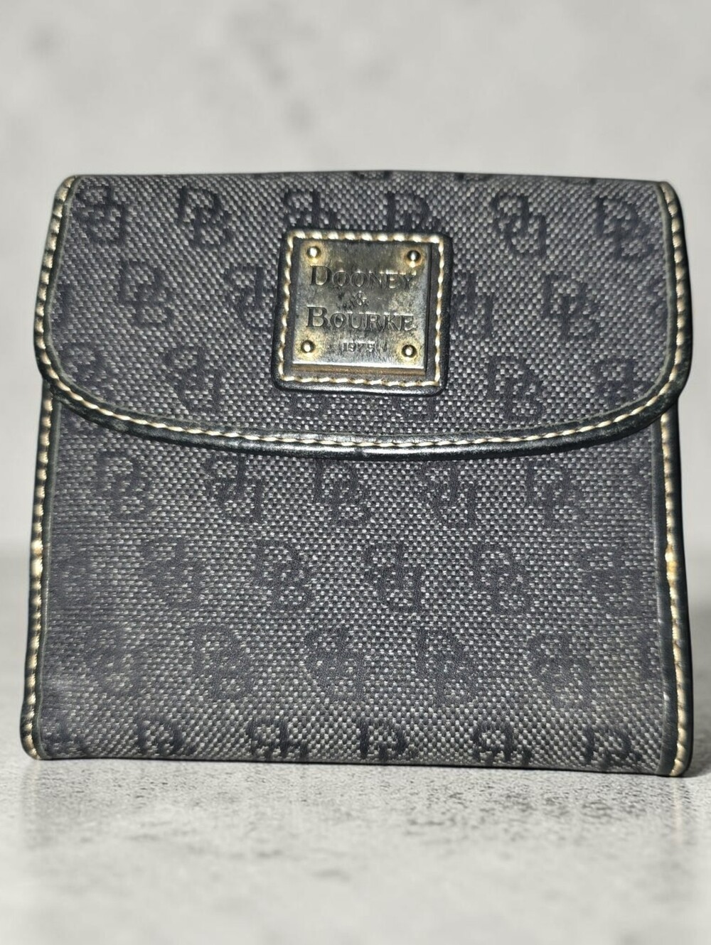 EUC Dooney & Bourke Black Logo Compact Wallet with Gold Plaque